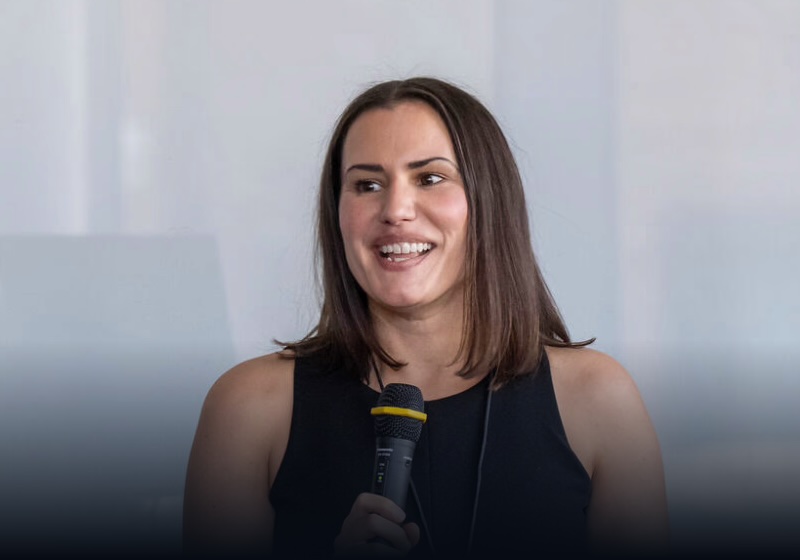 Alexandra Maxwell speaking at an event